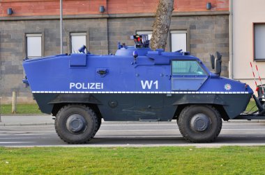 FRANKFURT, GERMANY - MARCH 18, 2015: Armored police car, Demonst clipart