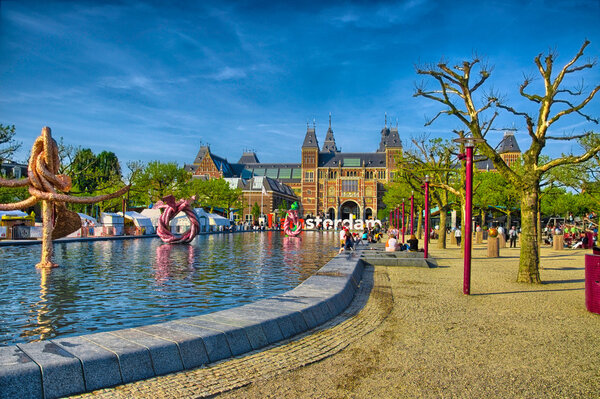 Sculptures in water near Rijksmuseum Amsterdam museum in Holland