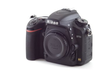 OSINNIKI, RUSSIA - DECEMBER 07, 2014: Nikon D750 camera body, the first digital SLR camera FX in Nikon's history  with swivel screen and WI-FI clipart