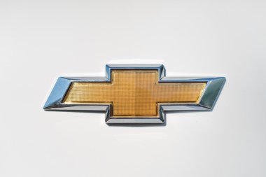 Osinniki  june 28 2015 : Close up of Chevrolet logo on Cruz car on June 28, 2015 in Osinniki, Russia clipart