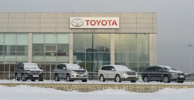 Novokuznetsk - January 14: Toyota logo on January 14, 2016 in Novokuznetsk, Russia. Toyota Motor Corporation is a Japanese automotive manufacturer. clipart