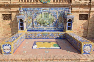 SEVILLE, SPAIN - OCTOBER 28, 2014: The Orense as one of the tiled 'Province Alcoves' along the walls of the Plaza de Espana (1920s) by Domingo Prida.