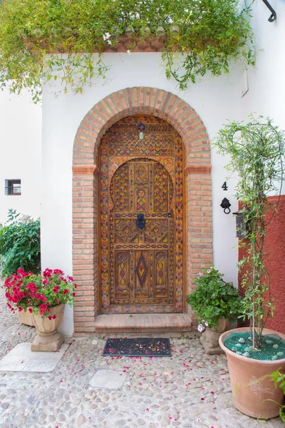 GRANADA, SPAIN - MAY 30, 2015: The door of house in mudejar style. — Stok fotoğraf