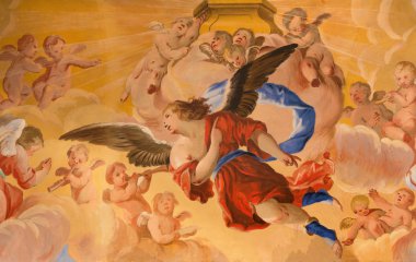GRANADA, SPAIN - MAY 31, 2015: The detail of angles fresco in baroque sanctuary (Sancta Sanctorum) in church Monasterio de la Cartuja by Palomino (early of 18. cent.)