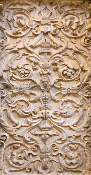 GRANADA, SPAIN - MAY 31, 2015: The baroque stone decoration relief in church Monasterio de la Cartuja. — Stock Photo, Image