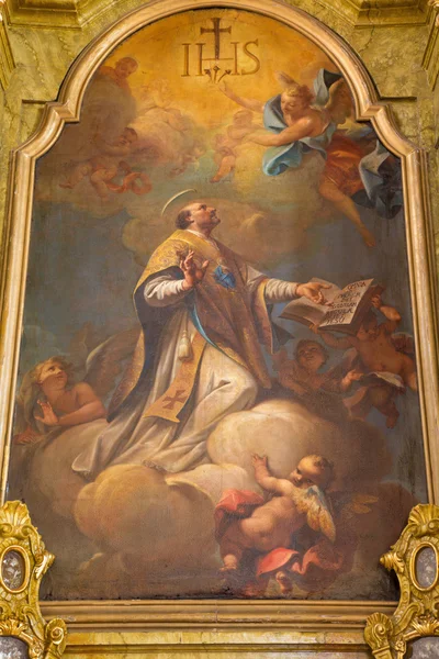 BANSKA STIAVNICA, SLOVAKIA - FEBRUARY 5, 2015: The paint of Saint Ignace by J. G. D. Grasmair (1729) on the side altar of  parish church of Assumption of Virgin Mary. — Stock Photo, Image