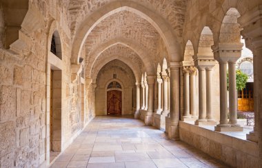 BETHLEHEM, ISRAEL - MARCH 6, 2015: The gothic corridor of atrium at St. Catharine church.