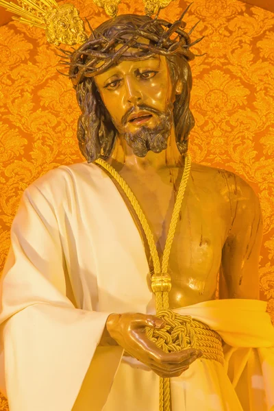 CORDOBA, SPAIN - MAY 27, 2015: The typically statue of vestet (Jesus Christ Nuestro Padre de la Humildad) by Antonio Bernal (1997) in church Convento de Capuchinos (Iglesia Santo Angel). — ストック写真