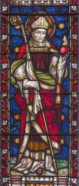 Roma, İtalya - 9 Mart 'ta. 2016: Clayton and Hall 'daki All Saints Anglikan Kilisesi' nin mozaik camında Aziz Augustine (19cent..)