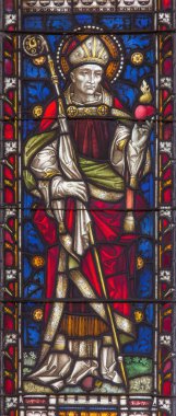 Roma, İtalya - 9 Mart 'ta. 2016: Clayton and Hall 'daki All Saints Anglikan Kilisesi' nin mozaik camında Aziz Augustine (19cent..)