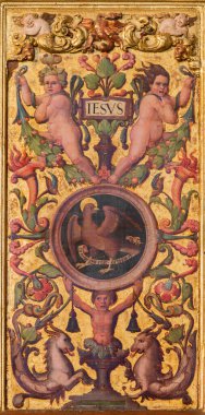 AVILA, SPAIN, APRIL - 18, 2016: Cornelius de Holanda 'nın Catedral de Cristo Salvador' daki kilisesinin platerik dekoratif kapısı. Aziz Evangelist Yahya 'nın sembolik....