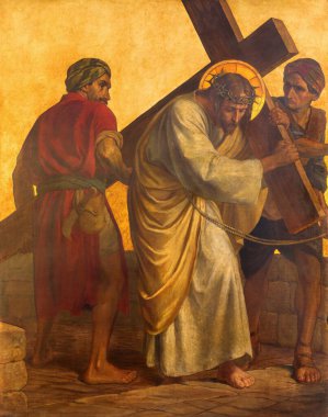 BERLIN, GERMANY, FEBRUARY - 16, 2017:  The paint on the metal plate - Simon of Cyrene helps Jesus carry the cross in church St. Matthew  by Philipp Schumacher (1907 - 1915). clipart