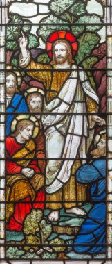 LONDON, GREAT BRITAIN - SEPTEMBER 17, 2017: The Apparition of resurected Jesus to apostle on the stained glass in church Holy Trinity Brompton. clipart