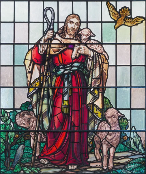 LONDON, GREAT BRITAIN - SEPTEMBER 15, 2017: The Jesus as The Good Shepherd on the satined glass of St James\'s Church, Clerkenwell (1938).