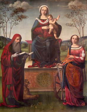 REGGIO EMILIA, ITALY - 12 Nisan 2018: Madonna 'nın Çocuk ve St. Jerome ve St. Catherine in Dome' daki tablosu 16 cent 'ten itibaren Luigi Anguissola tarafından yapıldı..