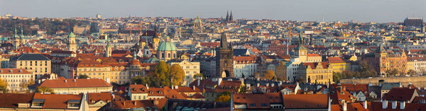 Prague - The panorama of the city with the Charles bridge on Olt Town in evening light.