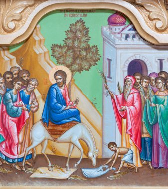 REGGIO EMILIA, ITALY - APRIL 12, 2018: The icon of Entry of Jesus in Jerusalem (Palm Sundy) on the iconostas in church Chiesa di San Giorgio in Reggio Emilia from 20 cent.