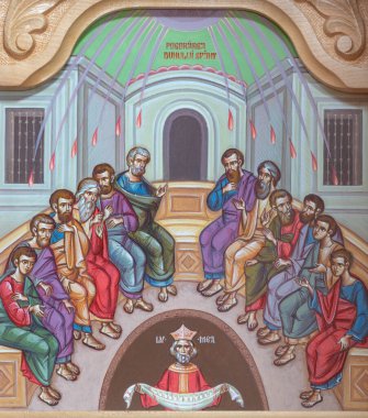 REGGIO EMILIA, ITALY - APRIL 12, 2018: The icon of Pentecost scene on the iconostas in church Chiesa di San Giorgio in Reggio Emilia from 20 cent.