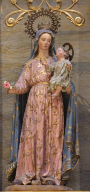 PALMA DE MALLORCA, SPAIN - JANUARY 29, 2019: The polychome carved sculpture of Madonna in the church Iglesia de Santa Maria Magdalena from 19. cent.