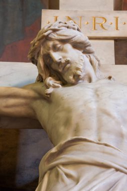 PRAGUE, CZECH REPUBLIC - OCTOBER 13, 2018: The marble Crucifixion in church kostel Svatho Vclava by  artvork prof. Suchard and made by enk Vosmk (end of 19. cent)