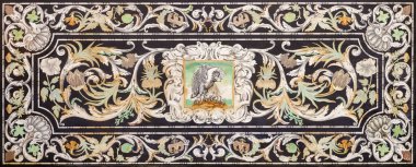 FERRARA, ITALY - JANUARY 30, 2020: The stone mosaic (Pietra dura) in church Basilica di San Giorgio fuori le mura.