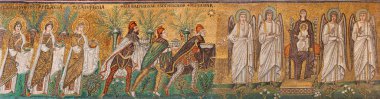 RAVENNA, ITALY - JANUARY 28, 2020: The mosaic of Tree Magi scene from church Basilica of Sant Apolinare Nuovo from the 6. cent. clipart