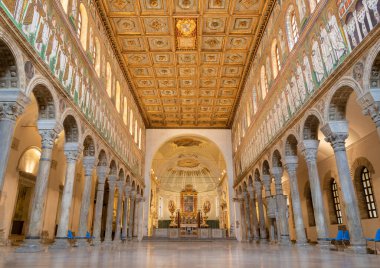 RAVENNA, ITALY - JANUARY 28, 2020: The nave of church Basilica of Sant Apolinare Nuovo from the 6. cent. clipart