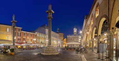 Ravena - The square Piazza del Popolo at dusk. clipart