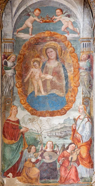 PADUA, ITALY - SEPTEMBER 9, 2014: The Madonna with the child by Bonino da Campione (14).(百分比)在Umberto da Carrara墓的Eremitani教堂(Chiesa degli Eremitani). — 图库照片