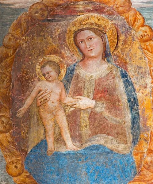 帕多瓦、 意大利-2014 年 9 月 9 日： 由博尼诺 da campione 儿童与麦当娜 （14。 ；） 在教会里的帕多瓦 （基耶萨德利帕多瓦) 作为墓的翁贝托 · 达卡拉拉的细节. — 图库照片