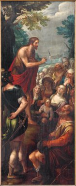 MECHELEN, BELGIUM - JUNE 14, 2014: The Sermon of st. John the Baptist as the  left panel of the Baptistm of Christ triptych in church Our Lady across de Dyle. clipart