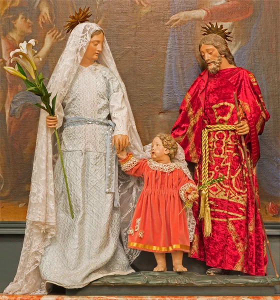 BRUSSELS, BELGIUM - JUNE 16, 2014: The Holy family in the dress in church Eglise de St Jean et St Etienne aux Minimes. — Stock Photo, Image
