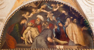PADUA, ITALY - SEPTEMBER 10, 2014: Paint of The Burial of Jesus scene in the church Chiesa di San Gaetano and the chapel of the Crucifixion by unknown painter from 17th century clipart