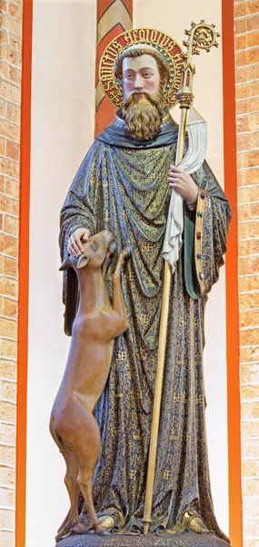 BRUGES, BELGIUM - JUNE 13, 2014: Carved polychrome satatue of Holy Egidius  in st. Giles church (Sint Gilliskerk) — Stock Photo, Image