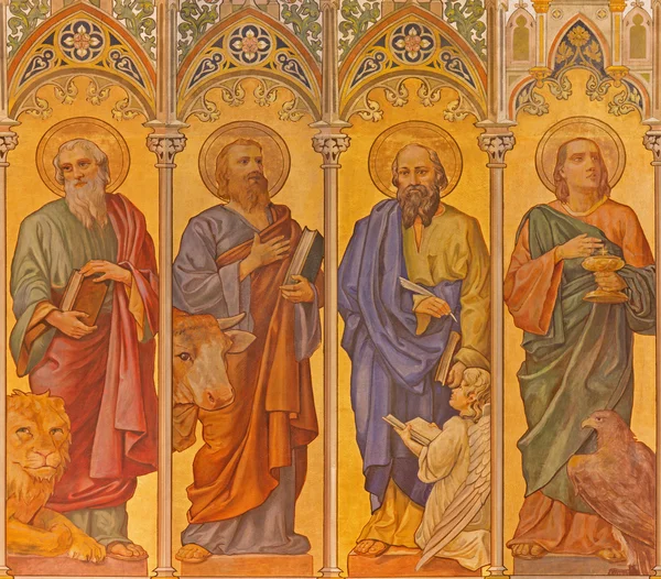 TRNAVA, SLOVAKIA - OCTOBER 14, 2014: The neo-gothic fresco of four  evangelists (Mark,Luke,Matthew,John) by Leopold Bruckner (1905 - 1906) in Saint Nicholas church. — Stock Photo, Image