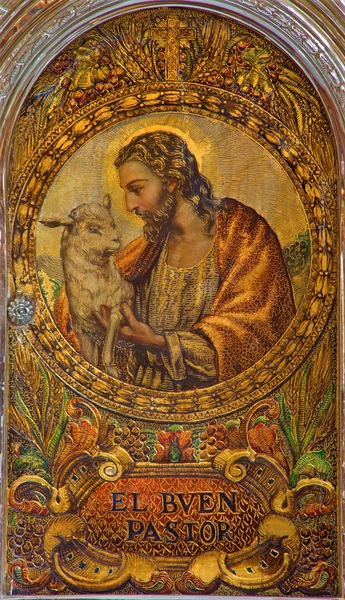 SEVILLE, SPAIN - OCTOBER 28, 2014: The Jesus Christ as Good Shepherd. Paint on the tabernacle in church Iglesia de San Roque from 19. cent. — Stock Photo, Image