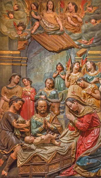 SEVILLE, SPAIN - OCTOBER 28, 2014: The baroque polychrome relief of the Adoration of shepherds in Church of El Salvador (Iglesia del Salvador) by by Juan de Oviedo (1609 - 16012). — Stock Photo, Image