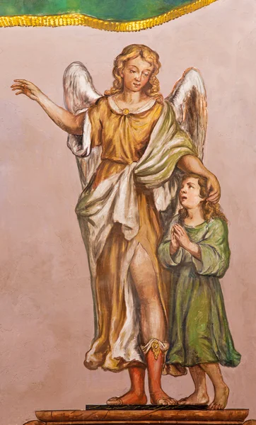 SEVILLE, ESPANHA - OUTUBRO 28, 2014: O afresco barroco do anjo da guarda na igreja Hospital de los Venerables Sacerdotes por Juan de Valdes Leal (1622 - 1690 ). — Fotografia de Stock