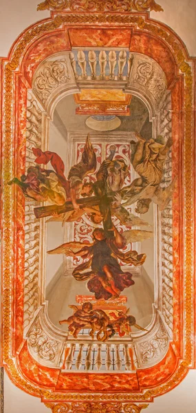 SEVILLE, SPAIN - OCTOBER 28, 2014: Fresco of angels with the cross. The baroque paint on the ceiling of sacristy of church Hospital de los Venerables Sacerdotes  by Juan de Valdes Leal (1622 - 1690). — Stock Photo, Image