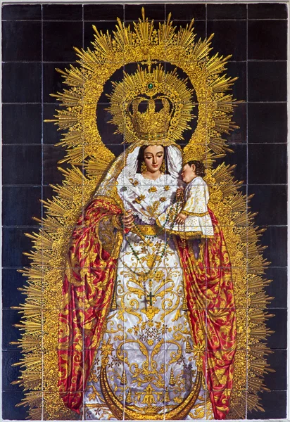 SEVILLE, SPAIN - OCTOBER 29, 2014: Den keramiske fliken Madonna i kirken Basilica del Maria Auxiliadora av A. Morilla fra 20 cent . – stockfoto