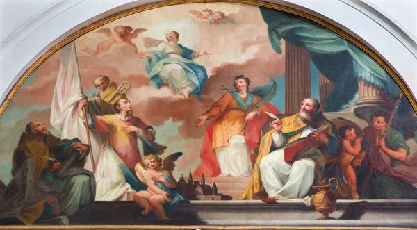 PADUA, ITÁLIA - SETEMBRO 8, 2014: Pintura de Virgem com os santos do século XVI por pintor desconhecido na Catedral de Santa Maria Assunta (Duomo ). — Fotografia de Stock