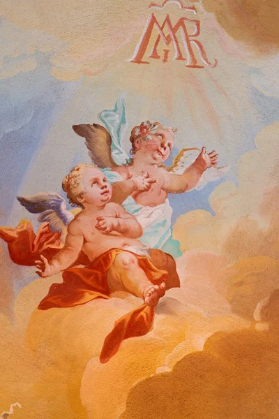 SAINT ANTON, SLOVAKIA - FEBRUARY 26, 2014: Angels fresco from ceiling of chapel in Saint Anton palace by Anton Schmidt from years 1750 - 1752. — Stock Photo, Image