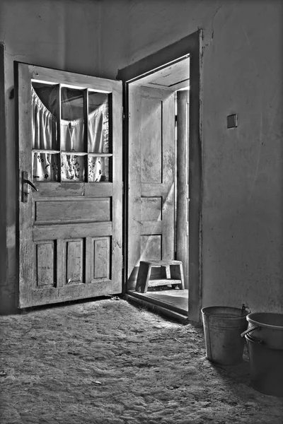 The open door of old village house form middle Slovakia