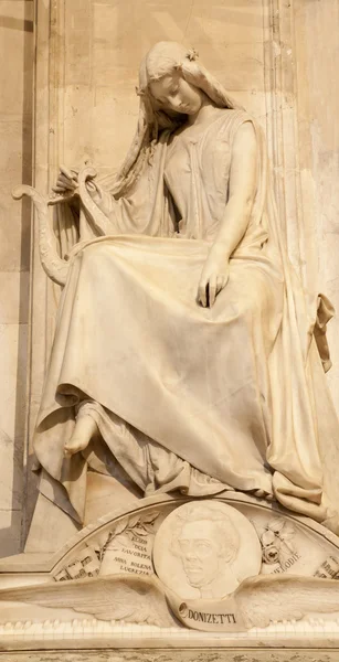 BERGAMO - JANUARY 26: Statue from the tomb of the composer Gaetano Donizetti by Vincenzo Vela (1855) in basilica Santa Maria Maggiore on January 26, 2013, in Bergamo, Italy. — Stock Photo, Image