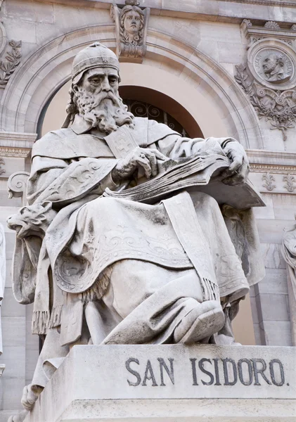 MADRID - MARCH 11: Saint Isidore of Seville from Portal of National Archaeological Museum of Spain projected by architect Francisco Jareno and built from 1866 to 1892 on March 11, 2013 in Madrid. — Stock Photo, Image