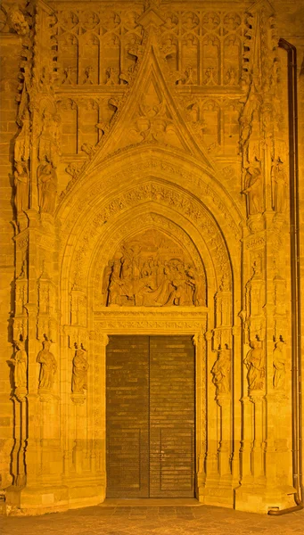 SEVILLE, SPAIN - OCTOBER 28, 2014: The Three Magi scene on the Puerta de los Palos on the Cathedral de Santa Maria de la Sede by Miguel Perrin (1481). — Stock Photo, Image