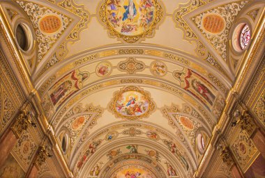SEVILLE, SPAIN - OCTOBER 29, 2014: The frescoes on the ceiling in church Basilica de la Macarena by Rafael Rodrguez (1949) in neobaroque style. clipart