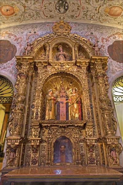 SEVILLE, SPAIN - OCTOBER 28, 2014: The side altar of st. Justina and Rufina patroness ot the town from year 1728 by Juan de Dios Moreno in baroque Church of El Salvador (Iglesia del Salvador). — Stock Photo, Image