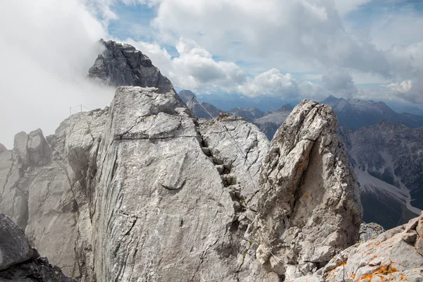 Alps - Watzmann peak in the cloud from summit of Hocheck — Stock Photo, Image