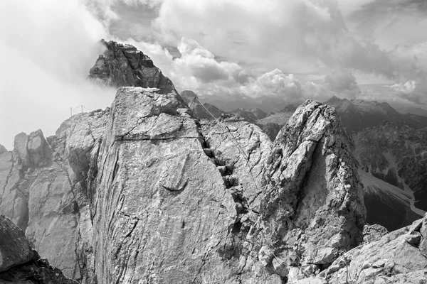 Alps - Watzmann peak in the cloud from summit of Hocheck — Stock Photo, Image